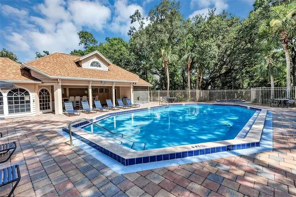 a view of a house with a swimming pool