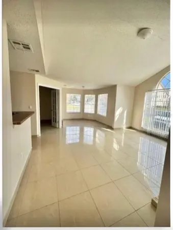 a view of a livingroom with a furniture