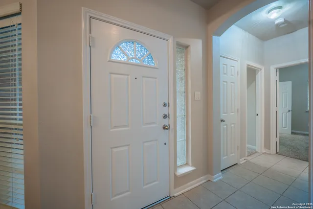 a view of an entryway and hallway