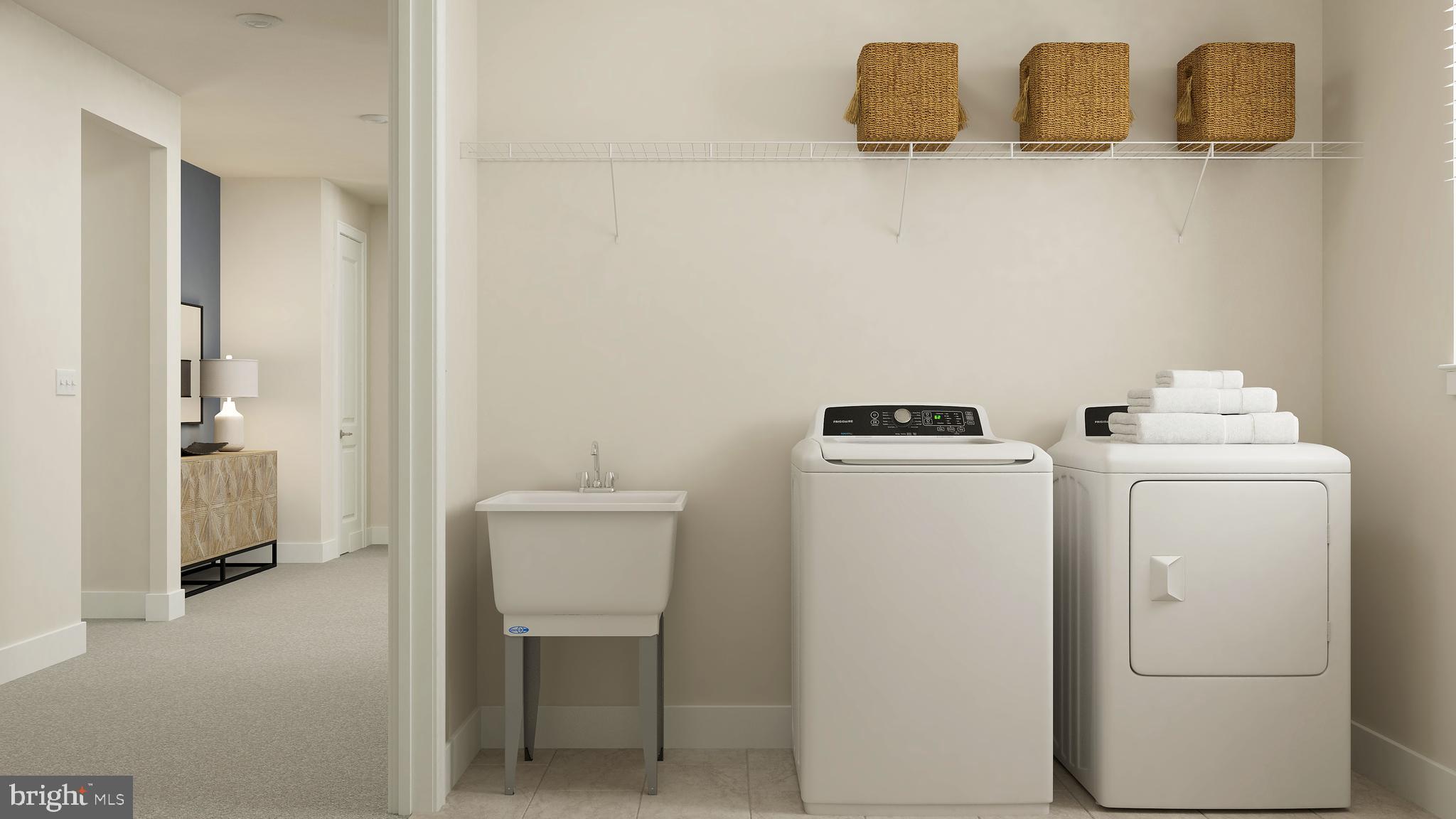 14033 Rolling Pasture Road Boyds, MD 20841 - Photo 18 of 36 a utility room with dryer and washer