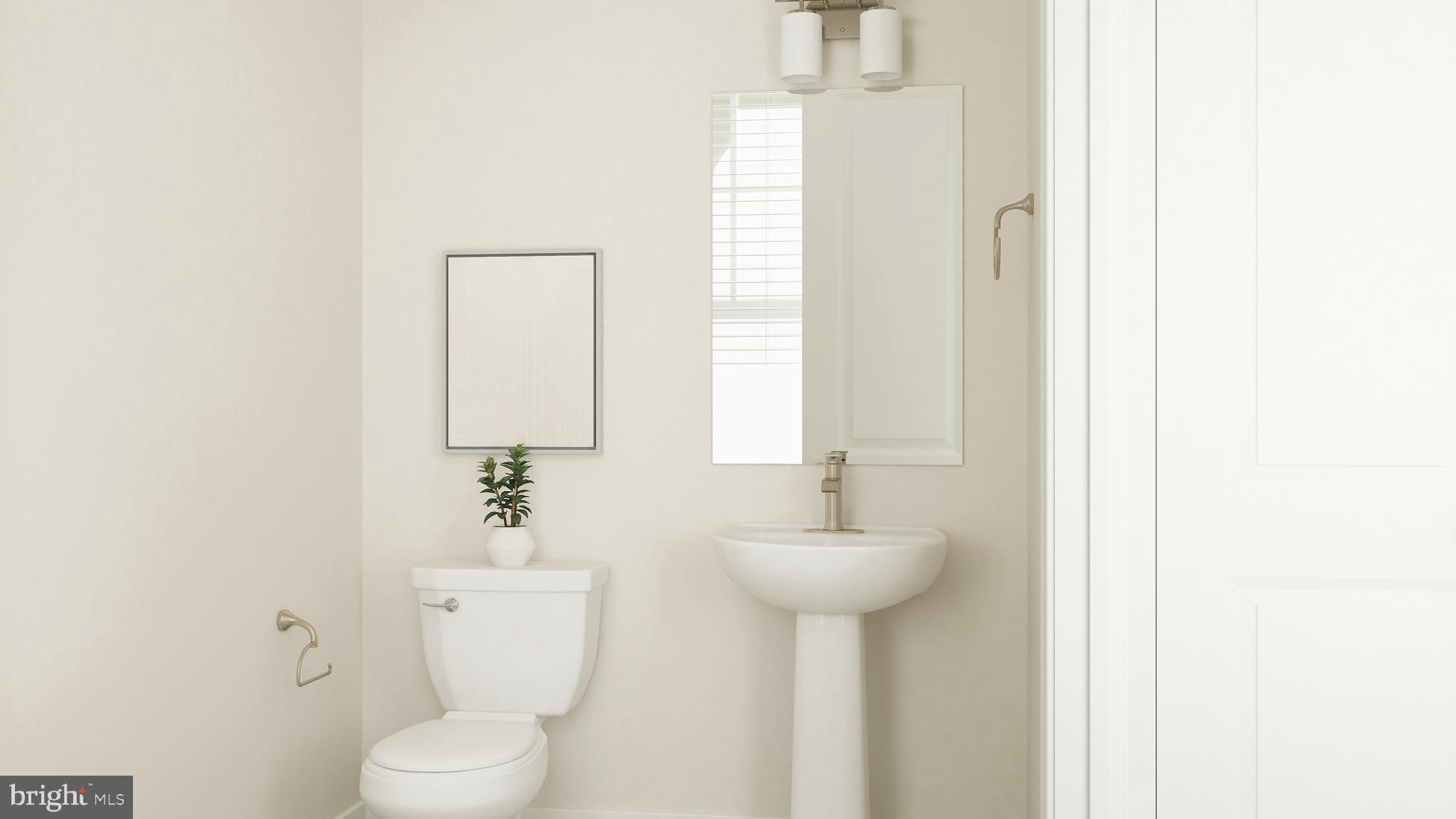 14033 Rolling Pasture Road Boyds, MD 20841 - Photo 33 of 36 a bathroom with a sink toilet and mirror