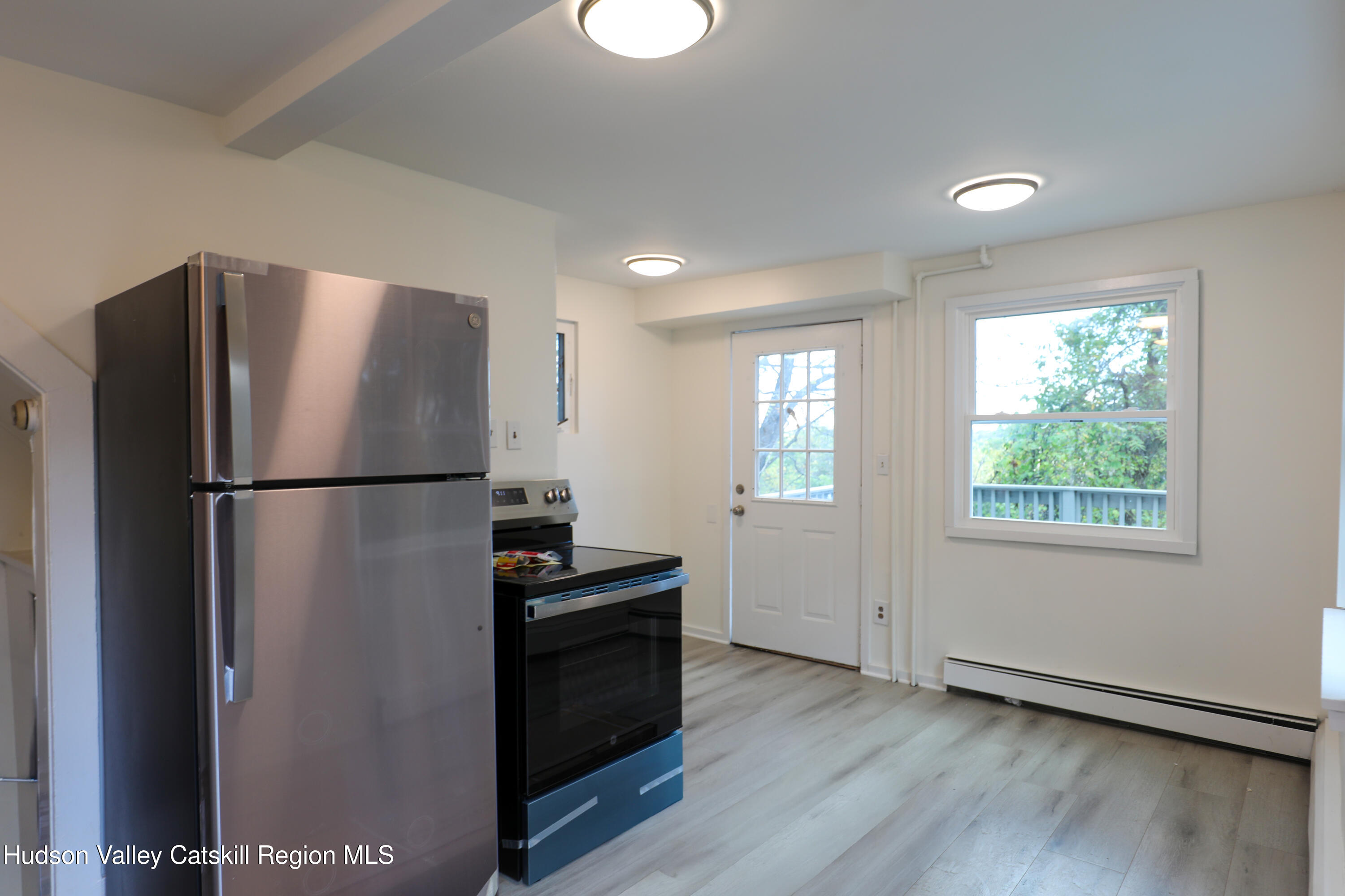 4294 Rte 9W, Unit 1 West Camp, NY 12490 - Photo 4 of 21 a view of kitchen with furniture refrigerator and window