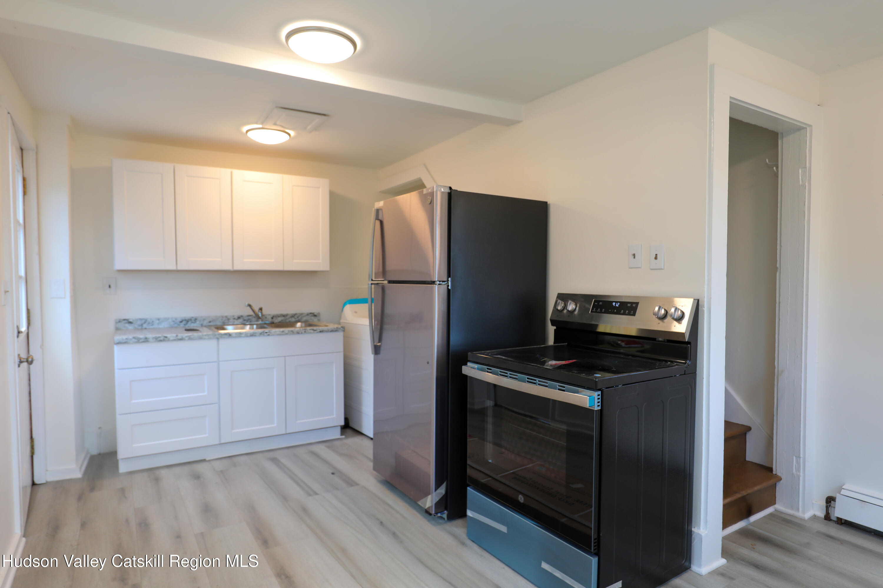 4294 Rte 9W, Unit 1 West Camp, NY 12490 - Photo 5 of 21 a kitchen with a stove refrigerator and microwave