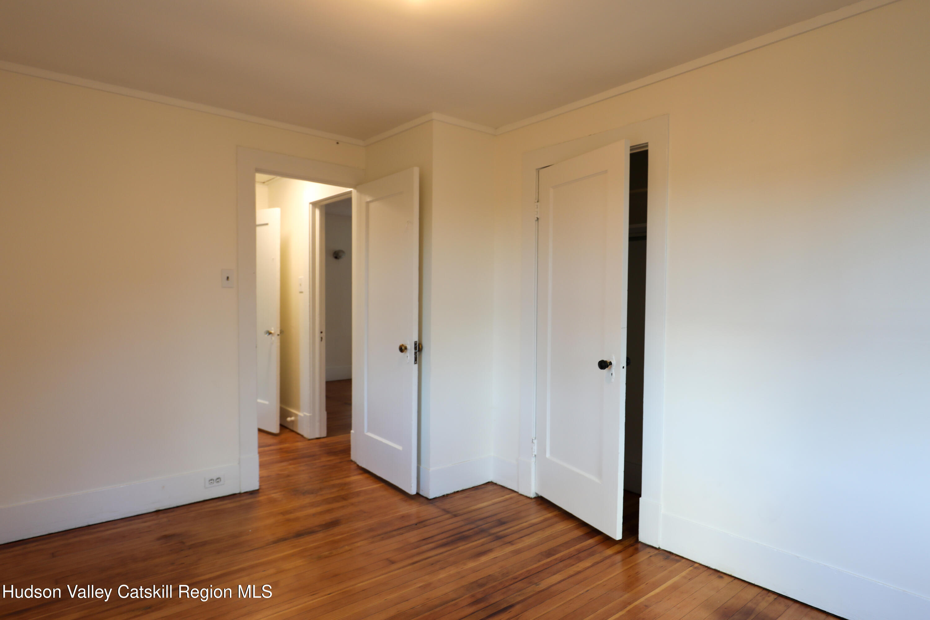 4294 Rte 9W, Unit 1 West Camp, NY 12490 - Photo 9 of 21 a view of an empty room with wooden floor