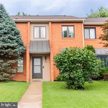 123 Caernarvon Court Exton, PA 19341 - Photo 1 of 43 a front view of a house with garden