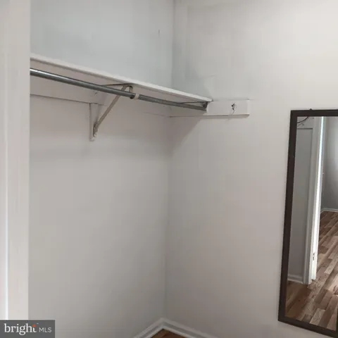 a view of a room with rack on the wall