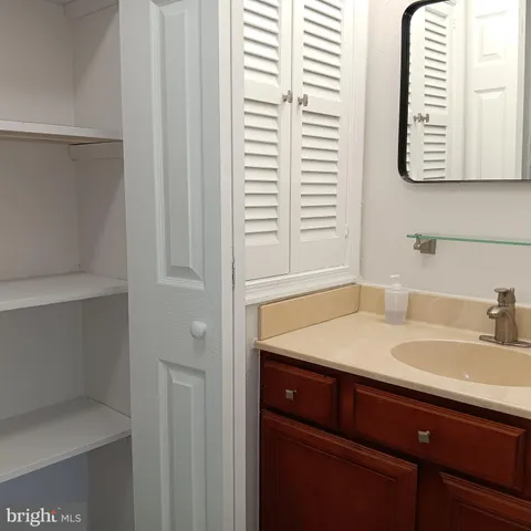 a bathroom with a shower and toilet