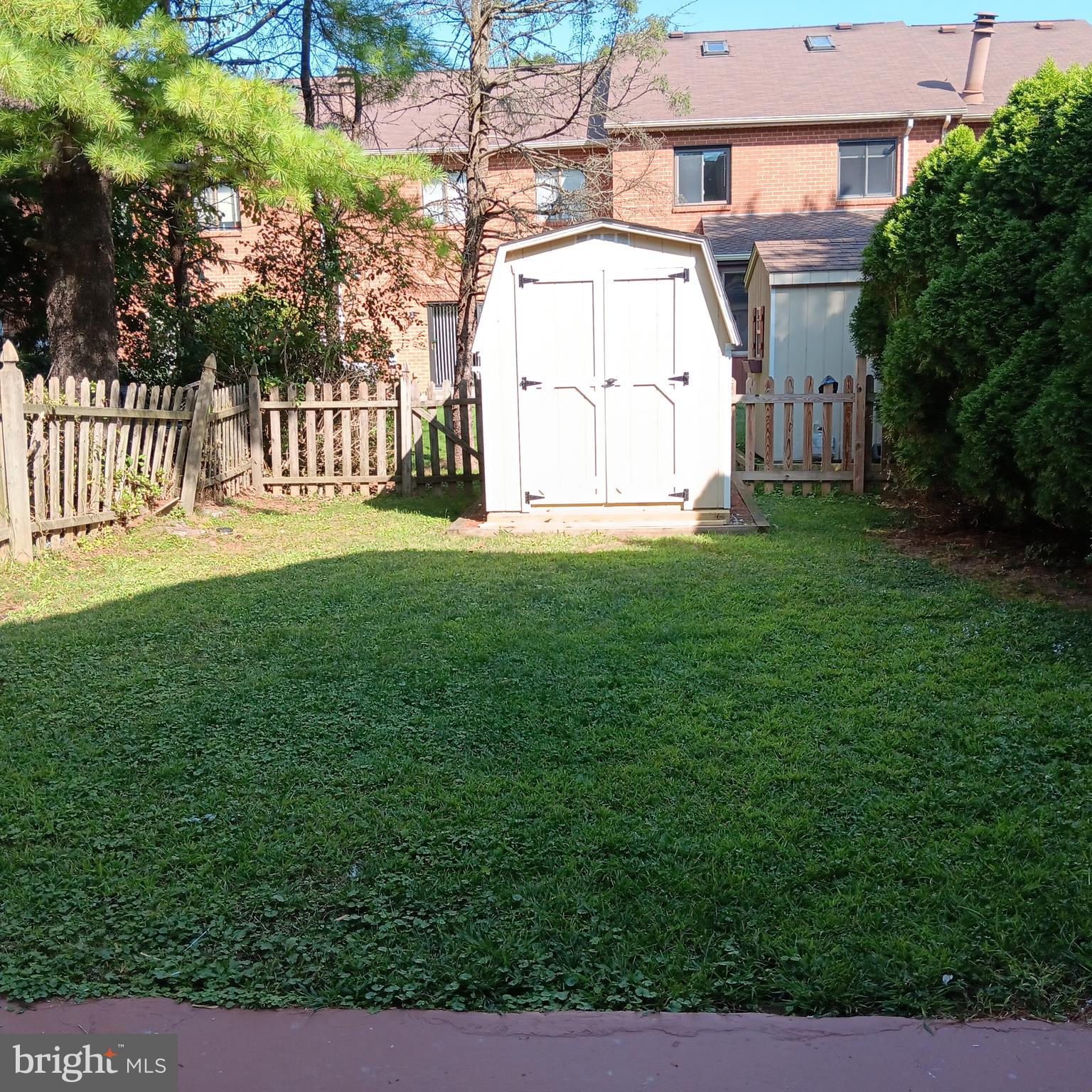 123 Caernarvon Court Exton, PA 19341 - Photo 5 of 43 a view of a house with backyard and a tree