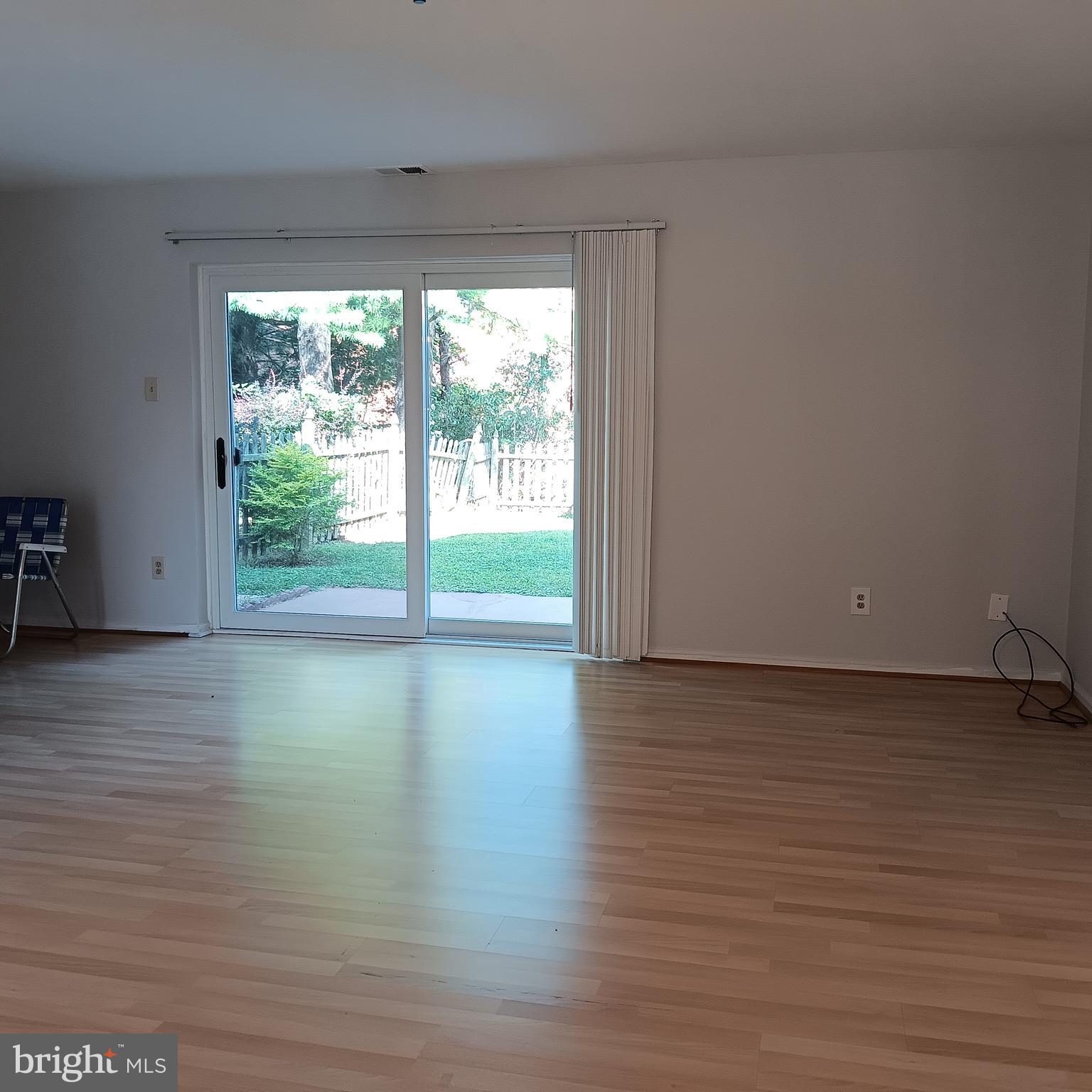 123 Caernarvon Court Exton, PA 19341 - Photo 8 of 43 a view of a room with wooden floor and window