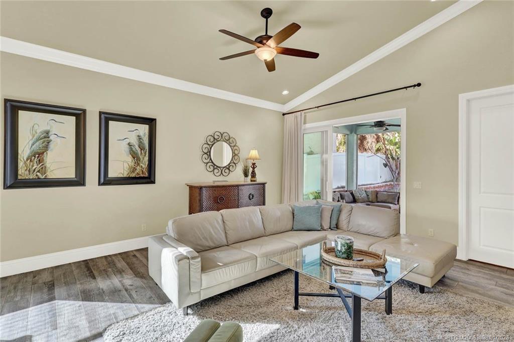 424 Southwest Camden Avenue Stuart, FL 34994 - Photo 22 of 58 a living room with furniture and a large window