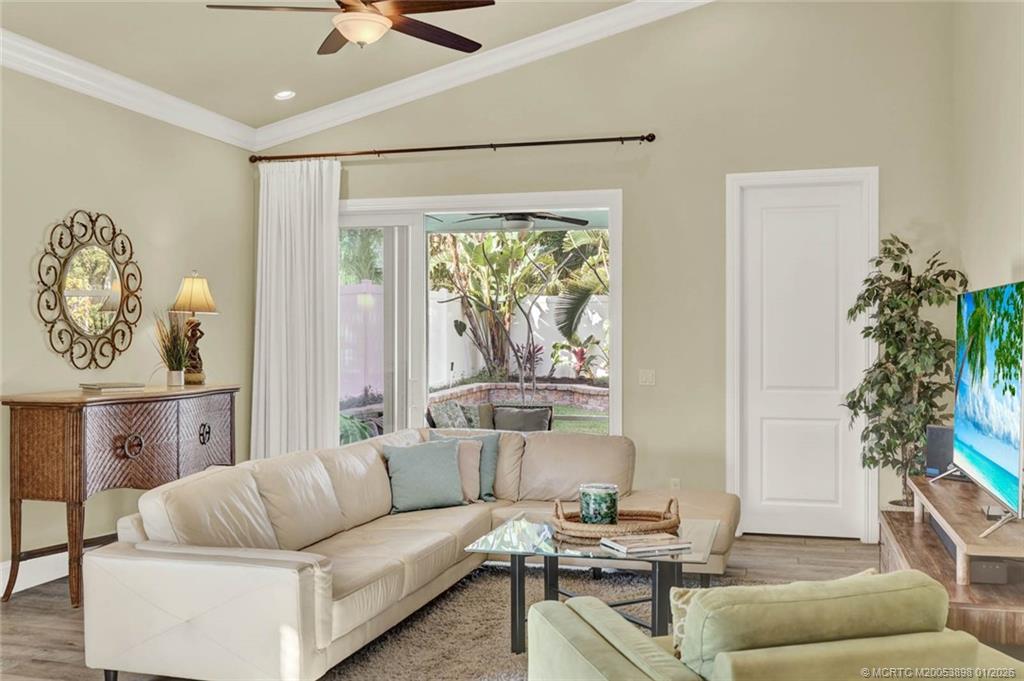 424 Southwest Camden Avenue Stuart, FL 34994 - Photo 23 of 58 a living room with furniture and a potted plant