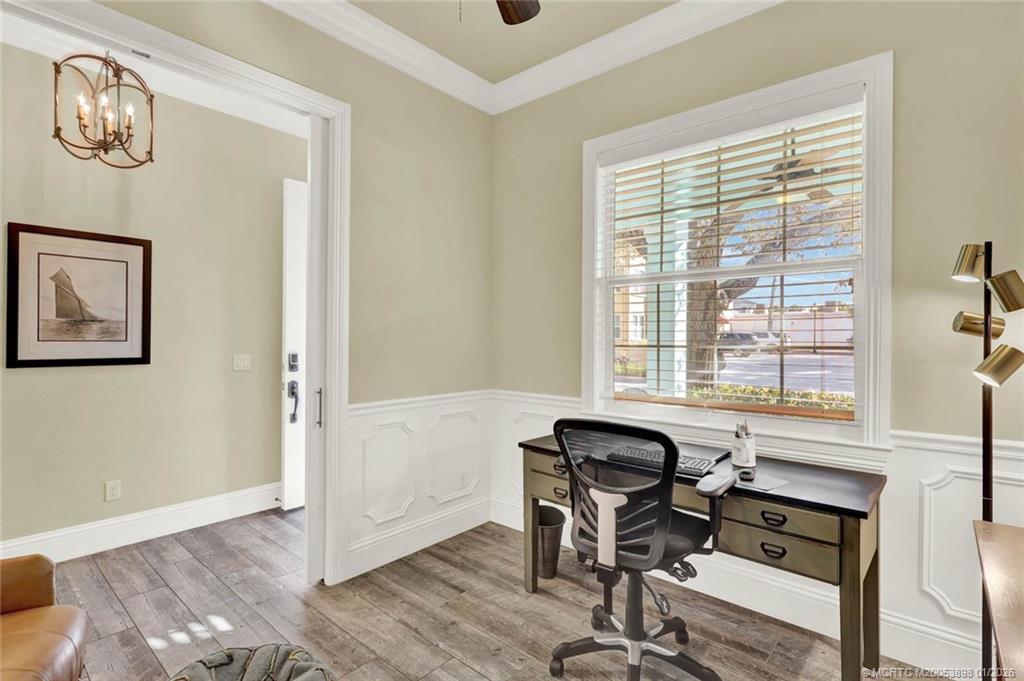 424 Southwest Camden Avenue Stuart, FL 34994 - Photo 26 of 58 a view of a workspace with furniture and a window