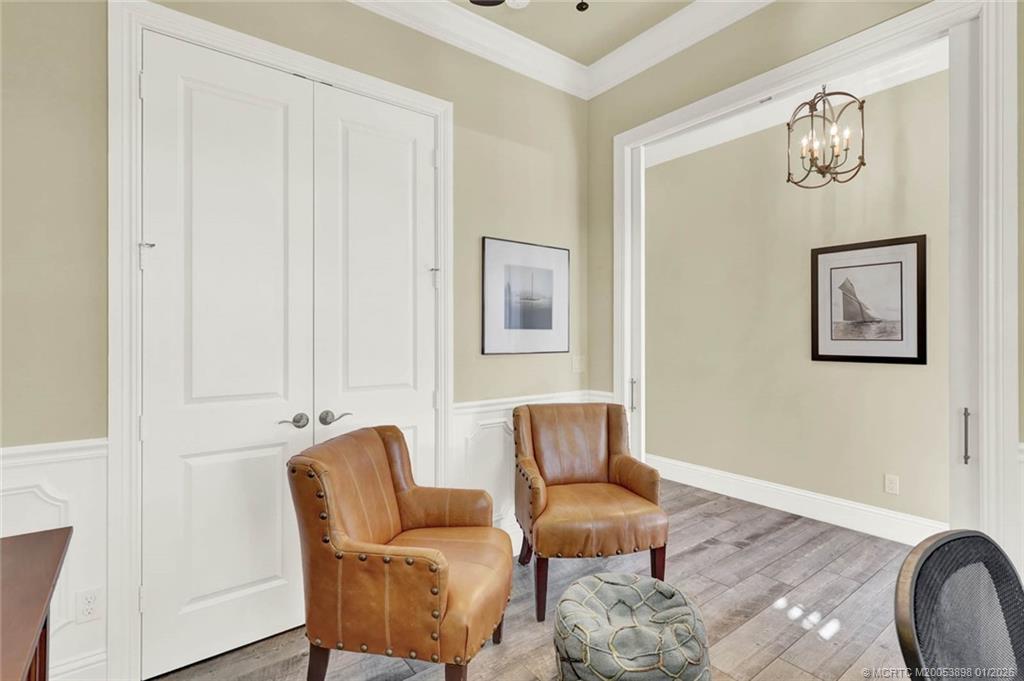 424 Southwest Camden Avenue Stuart, FL 34994 - Photo 27 of 58 a living room with furniture and a wooden floor