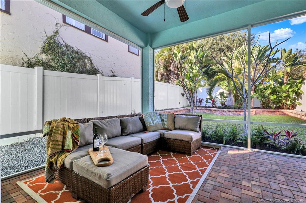 424 Southwest Camden Avenue Stuart, FL 34994 - Photo 42 of 58 a outdoor space with patio the couches and a potted plant