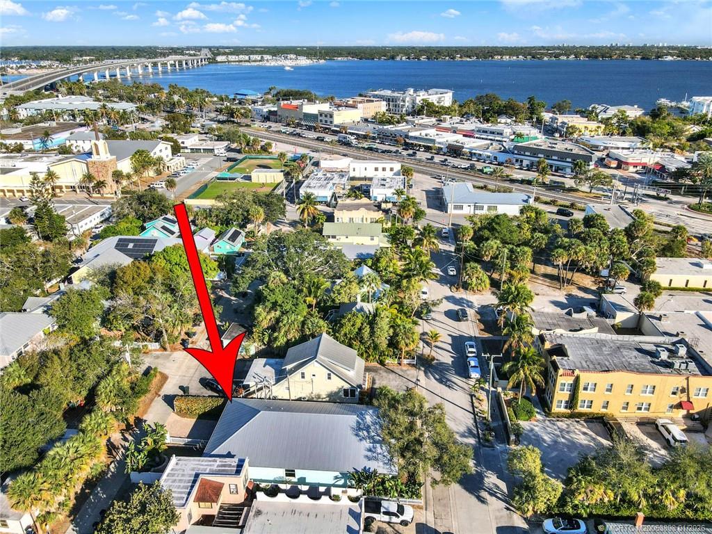424 Southwest Camden Avenue Stuart, FL 34994 - Photo 8 of 58 an aerial view of residential houses with outdoor space
