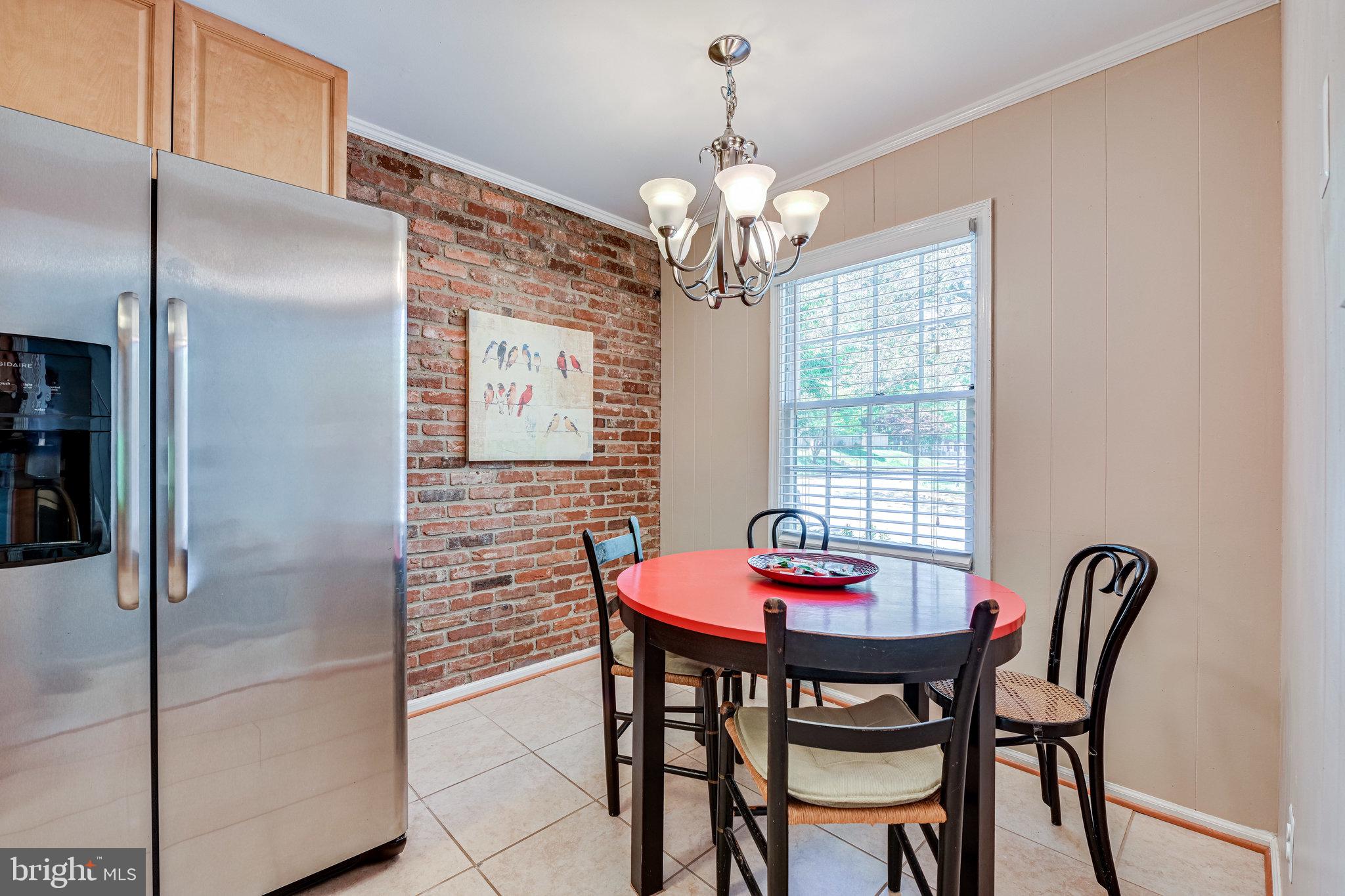 5927 Noblestown Road, Unit 49 Springfield, VA 22152 - Photo 11 of 33 Accent brick wall in kitchen