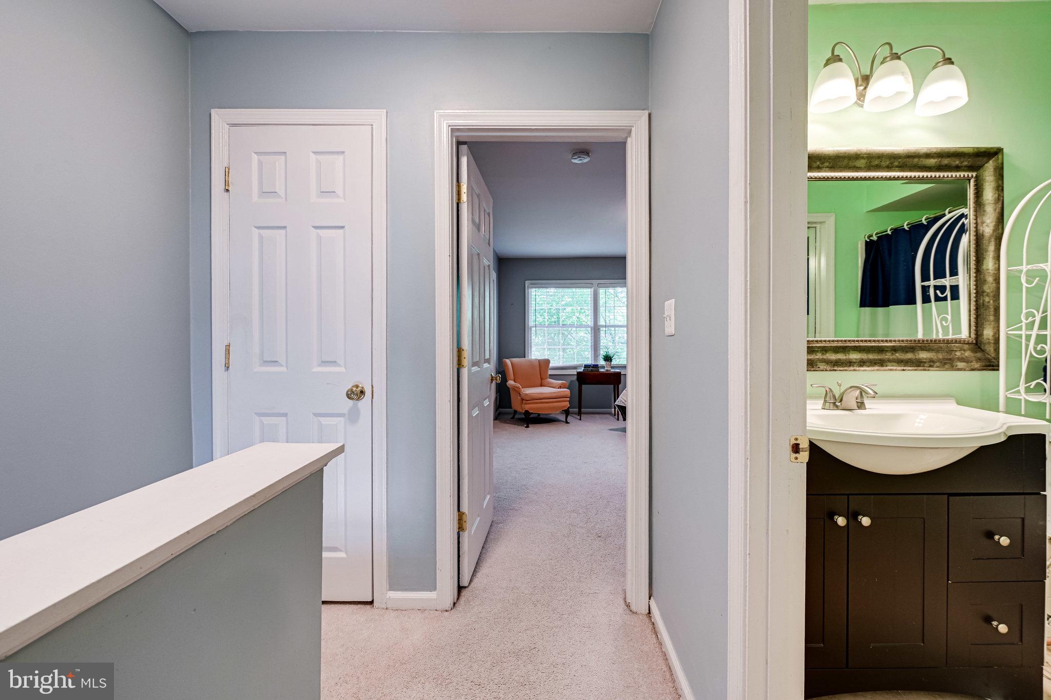 5927 Noblestown Road, Unit 49 Springfield, VA 22152 - Photo 13 of 33 Upper level landing to bedrooms + full bath