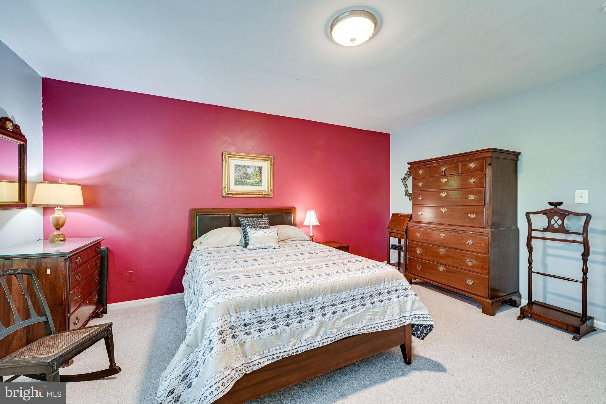 5927 Noblestown Road, Unit 49 Springfield, VA 22152 - Photo 14 of 33 Accent wall in primary bedroom
