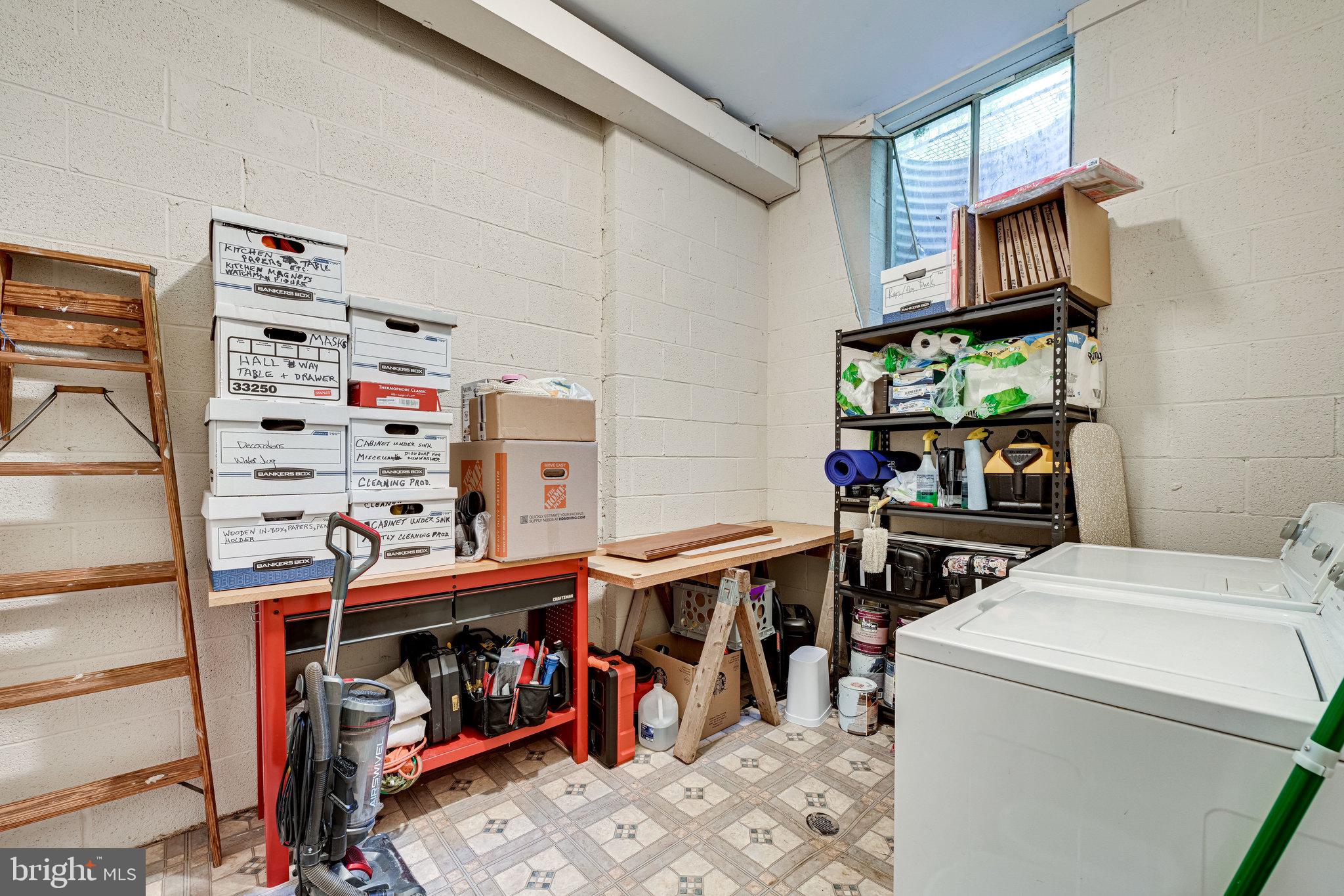 5927 Noblestown Road, Unit 49 Springfield, VA 22152 - Photo 28 of 33 Large lower level storage laundry room