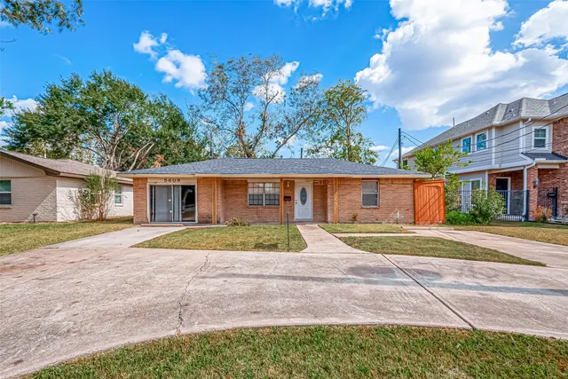 a house view with a backyard space