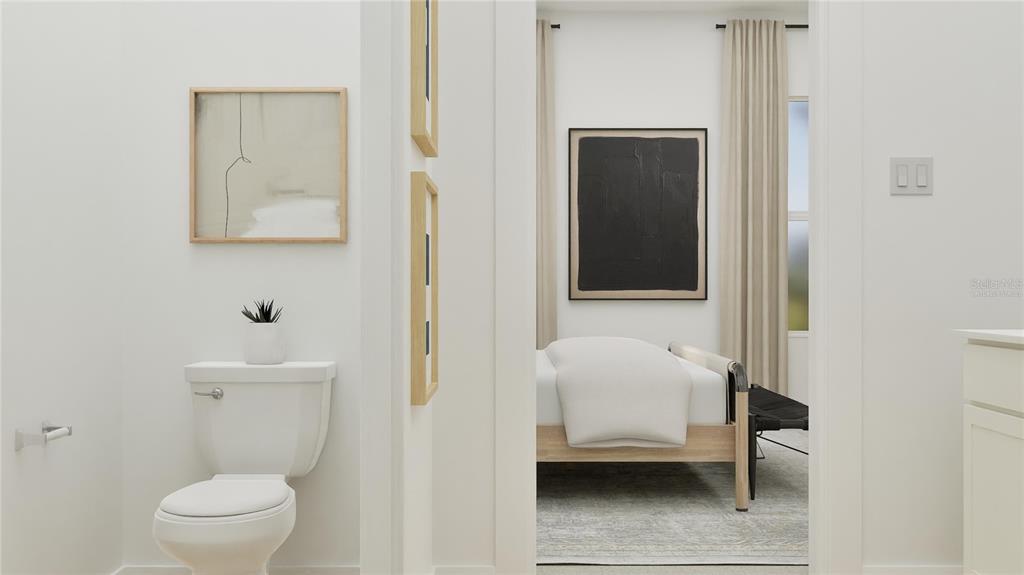 3070 Granite Rdg Avenue Minneola, FL 34715 - Photo 13 of 18 a bathroom with a toilet and a sink