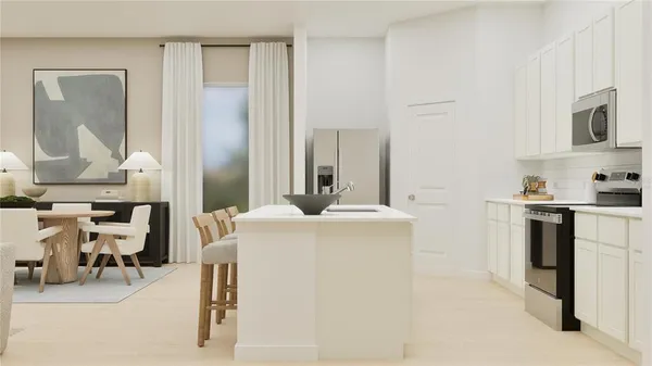 a kitchen with stainless steel appliances kitchen island granite countertop a sink and a stove top oven