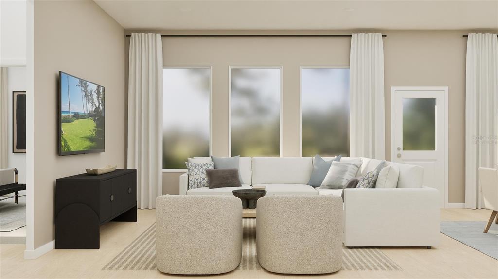 3070 Granite Rdg Avenue Minneola, FL 34715 - Photo 7 of 18 a living room with furniture and a flat screen tv