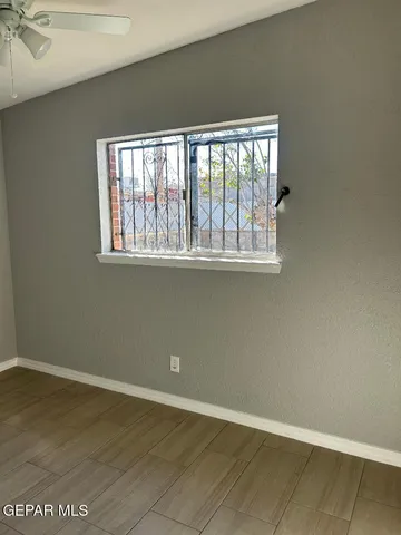 a view of an entryway with wooden floor