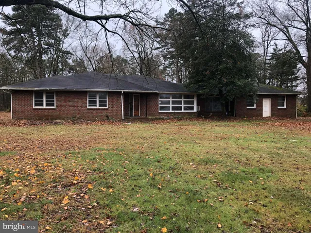 front view of a house with yard