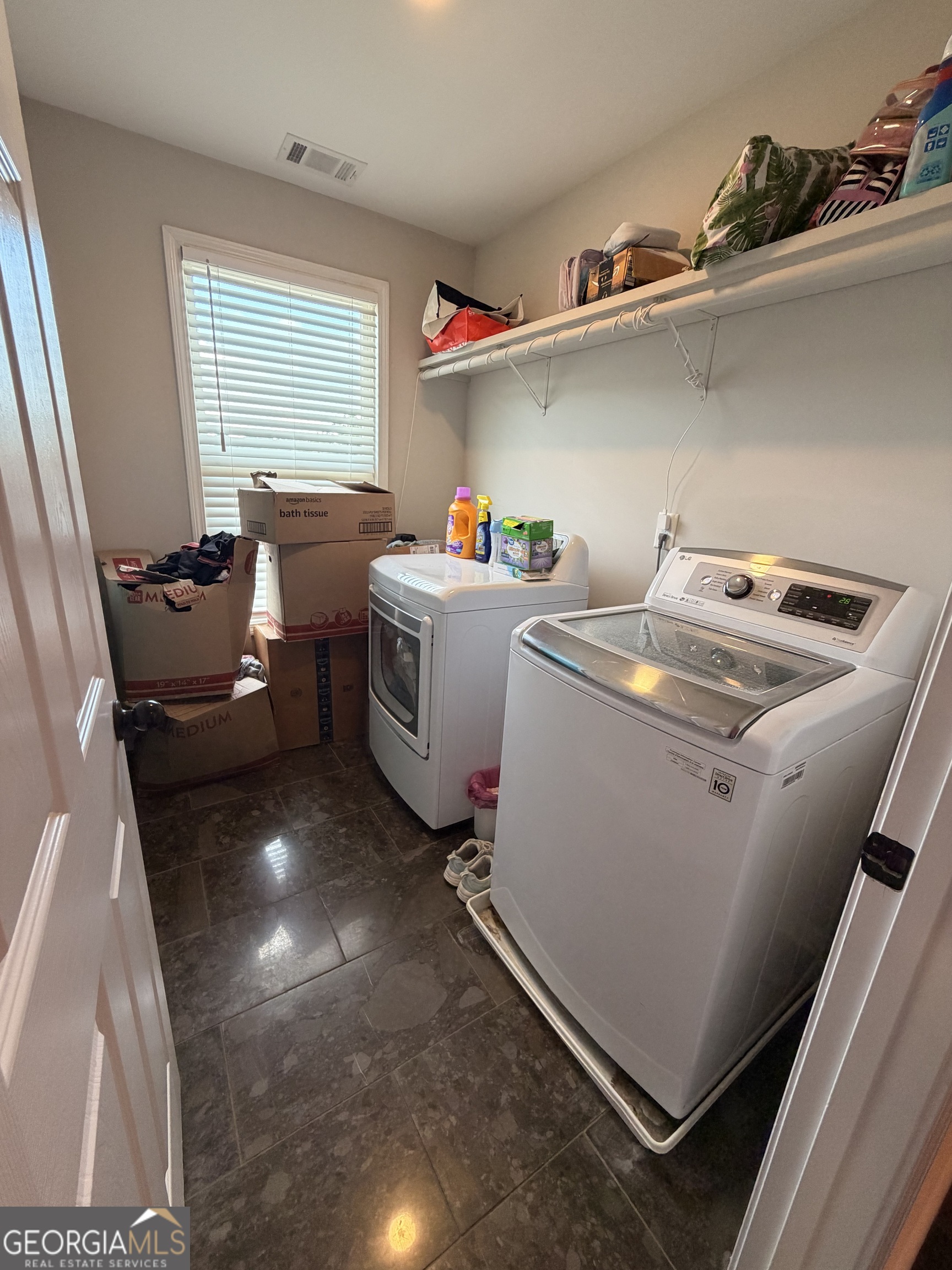 892 Perimeter Road Monticello, GA 31064 - Photo 19 of 38 a utility room with dryer and washer