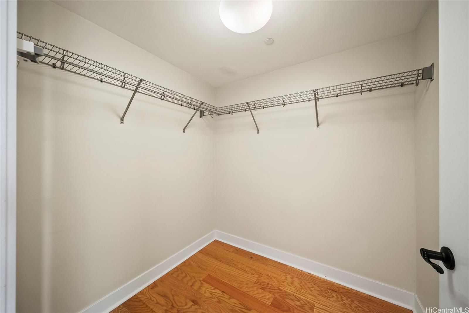 1551 Ala Wai Boulevard, Unit 504 Honolulu, HI 96815 - Photo 16 of 25 a view of a room with racks on the wall