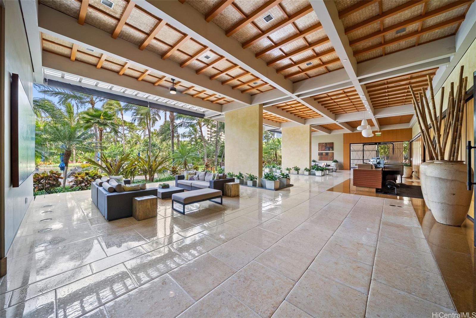1551 Ala Wai Boulevard, Unit 504 Honolulu, HI 96815 - Photo 2 of 25 a living room with furniture