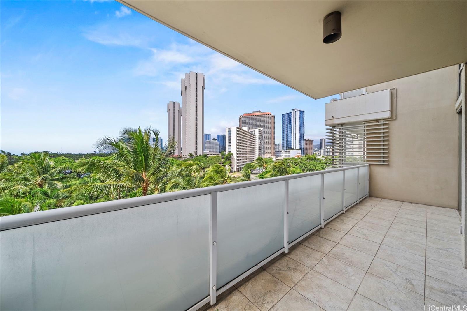 1551 Ala Wai Boulevard, Unit 504 Honolulu, HI 96815 - Photo 23 of 25 a view of a balcony with potted plants