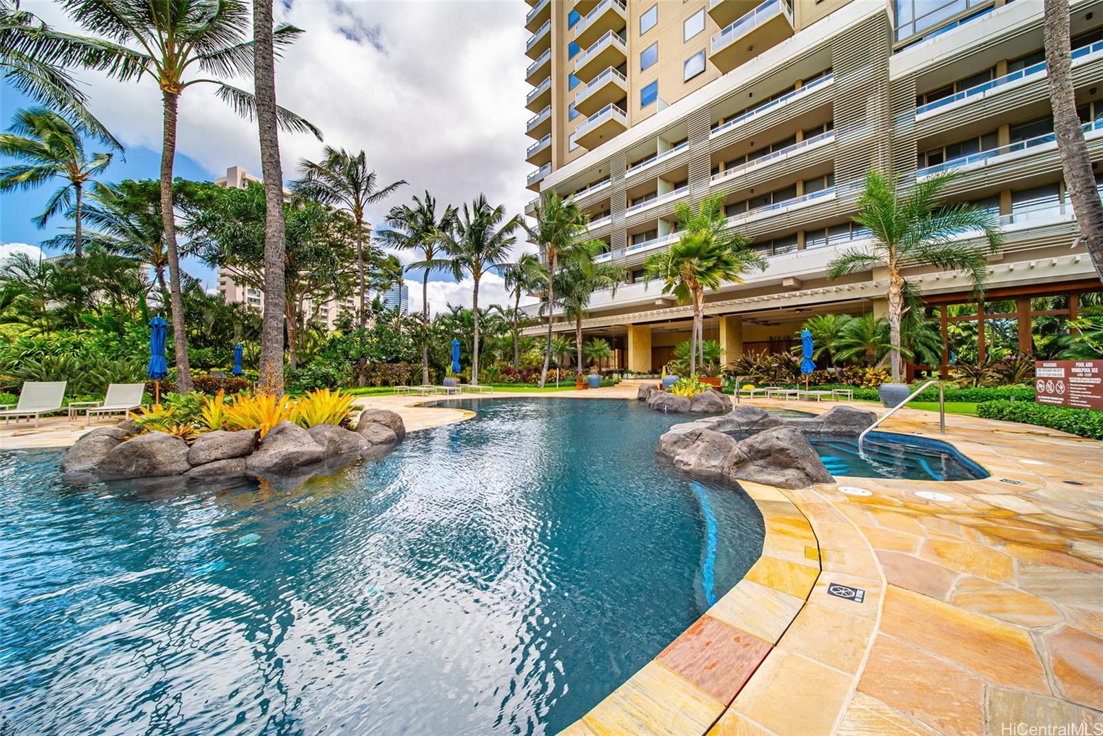 1551 Ala Wai Boulevard, Unit 504 Honolulu, HI 96815 - Photo 4 of 25 a view of swimming pool with outdoor seating and a patio