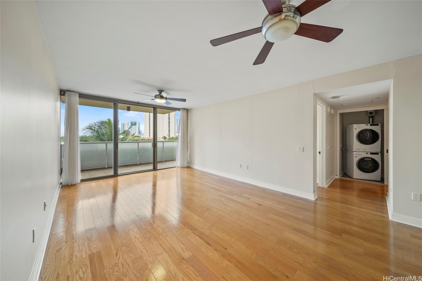 1551 Ala Wai Boulevard, Unit 504 Honolulu, HI 96815 - Photo 6 of 25 wooden floor in an empty room with a window