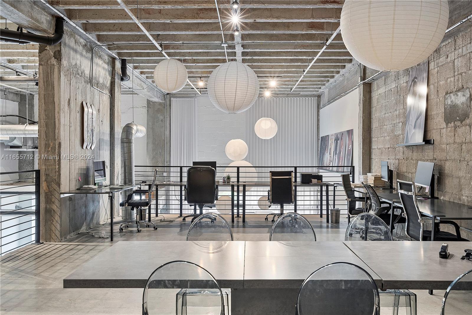 8101 Biscayne Boulevard, Unit C3 Miami, FL 33138 - Photo 13 of 25 wooden floor with outdoor seating