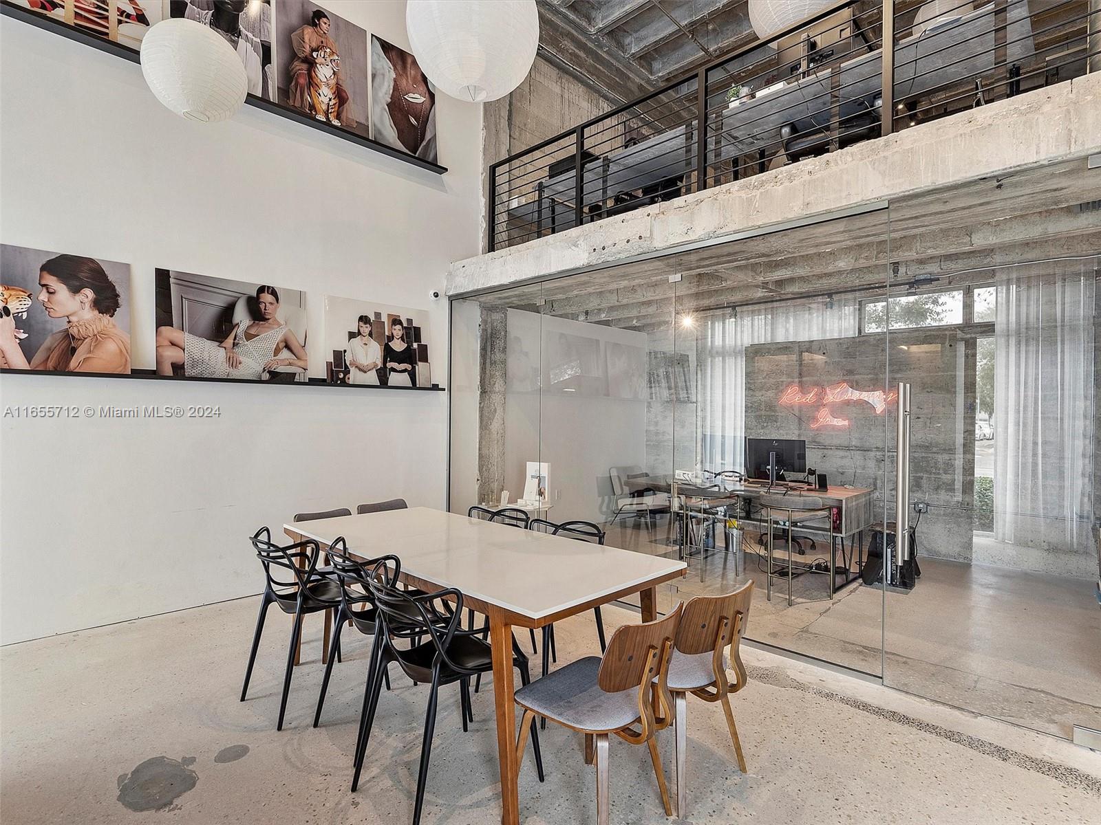 8101 Biscayne Boulevard, Unit C3 Miami, FL 33138 - Photo 23 of 25 a view of a dining room with furniture