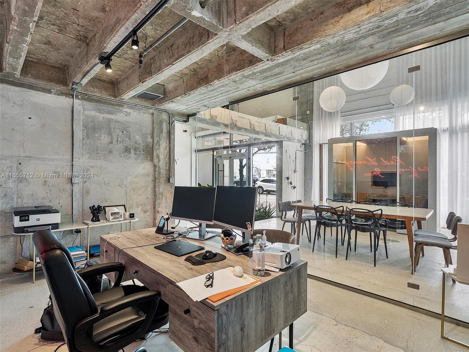 8101 Biscayne Boulevard, Unit C3 Miami, FL 33138 - Photo 25 of 25 a view of a dining room with furniture
