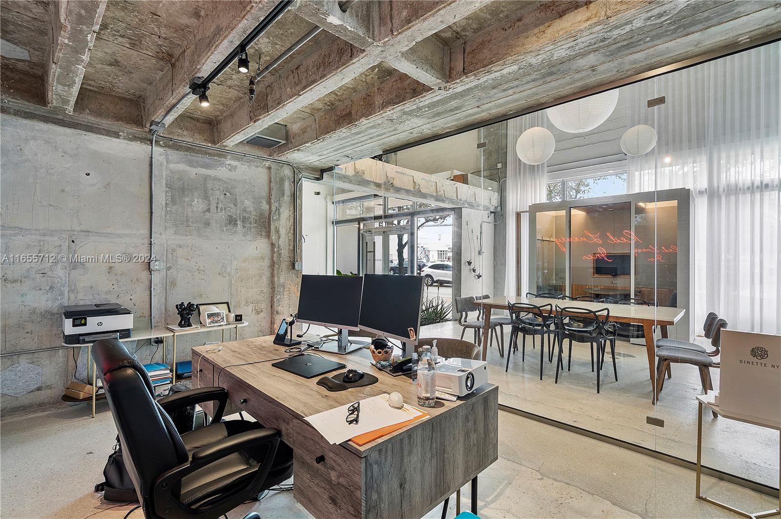 8101 Biscayne Boulevard, Unit C3 Miami, FL 33138 - Photo 6 of 25 a view of a dining room with furniture