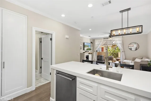 a room with a sink and a mirror