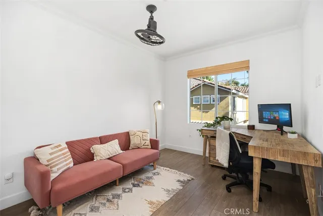 a workspace with furniture and window