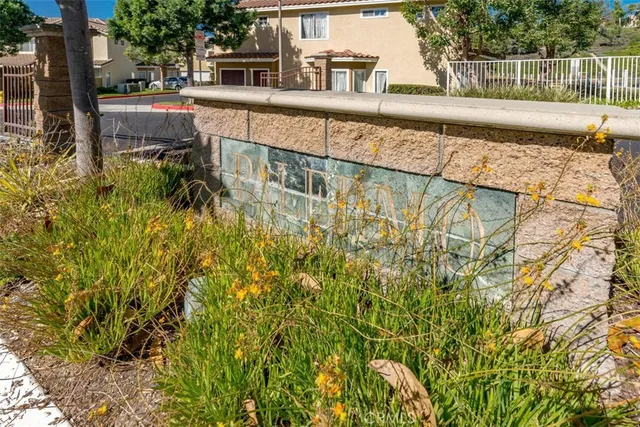 a view of swimming pool with outdoor seating and plants