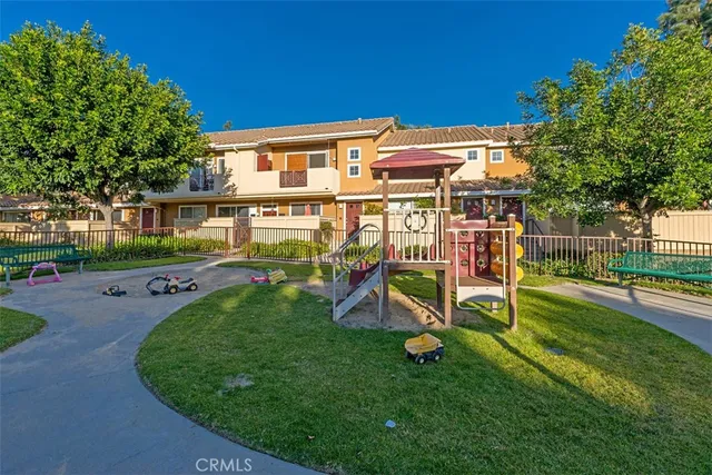 an aerial view of a house with a swimming pool