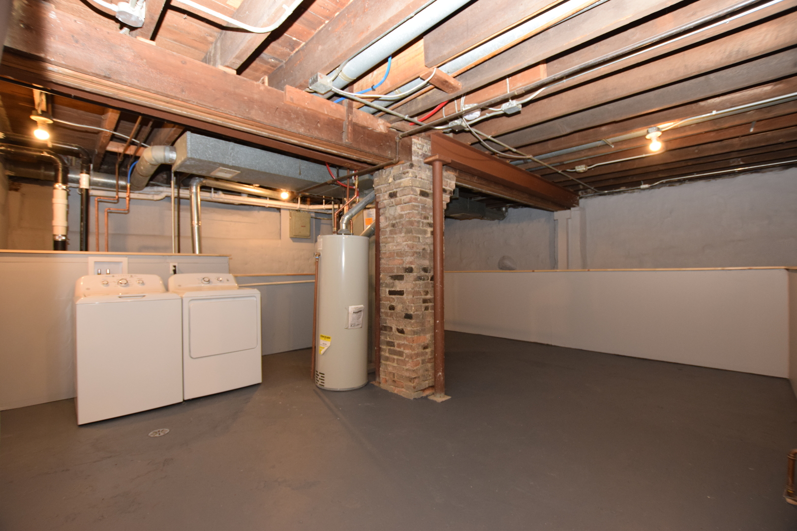 97 Gates Street Crystal Lake, IL 60014 - Photo 18 of 22 a utility room with dryer and washer