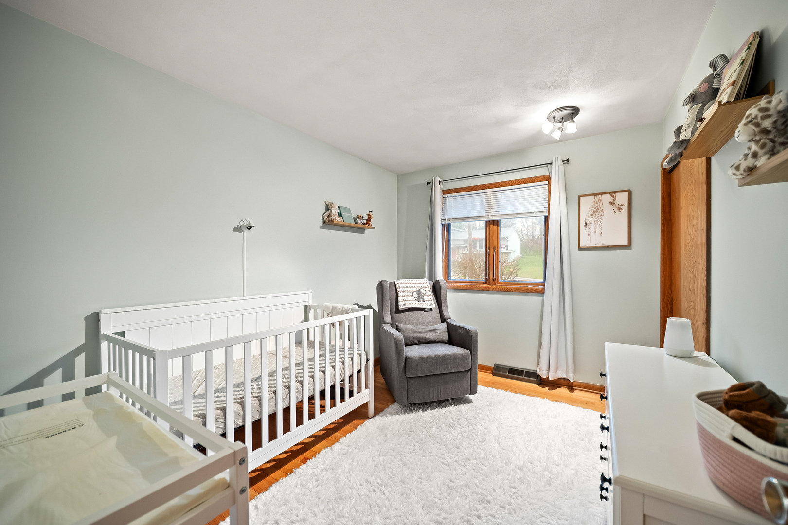 3138 12th Avenue Moline, IL 61265 - Photo 15 of 34 a bedroom with furniture and a window