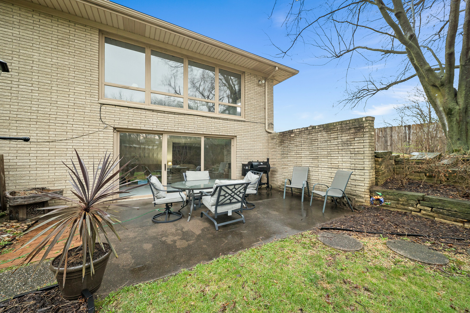 3138 12th Avenue Moline, IL 61265 - Photo 30 of 34 a backyard of a house with outdoor seating