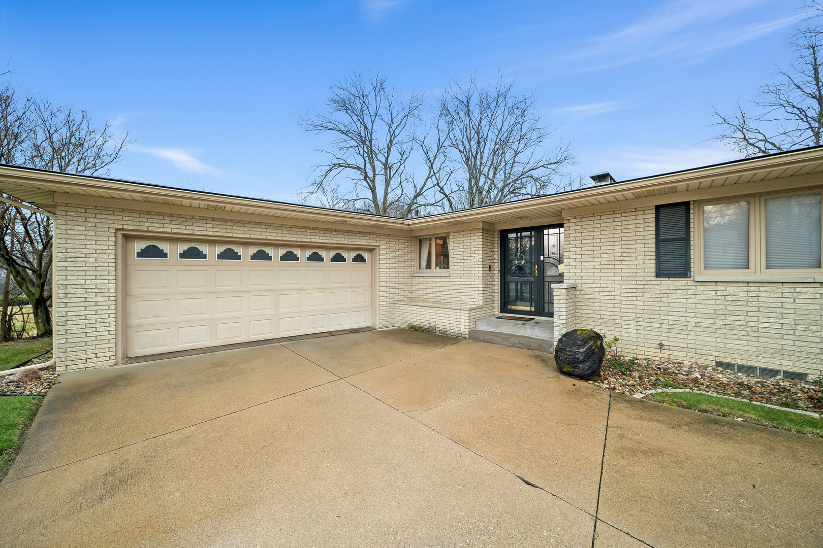 3138 12th Avenue Moline, IL 61265 - Photo 3 of 34 a view of a house with a garage