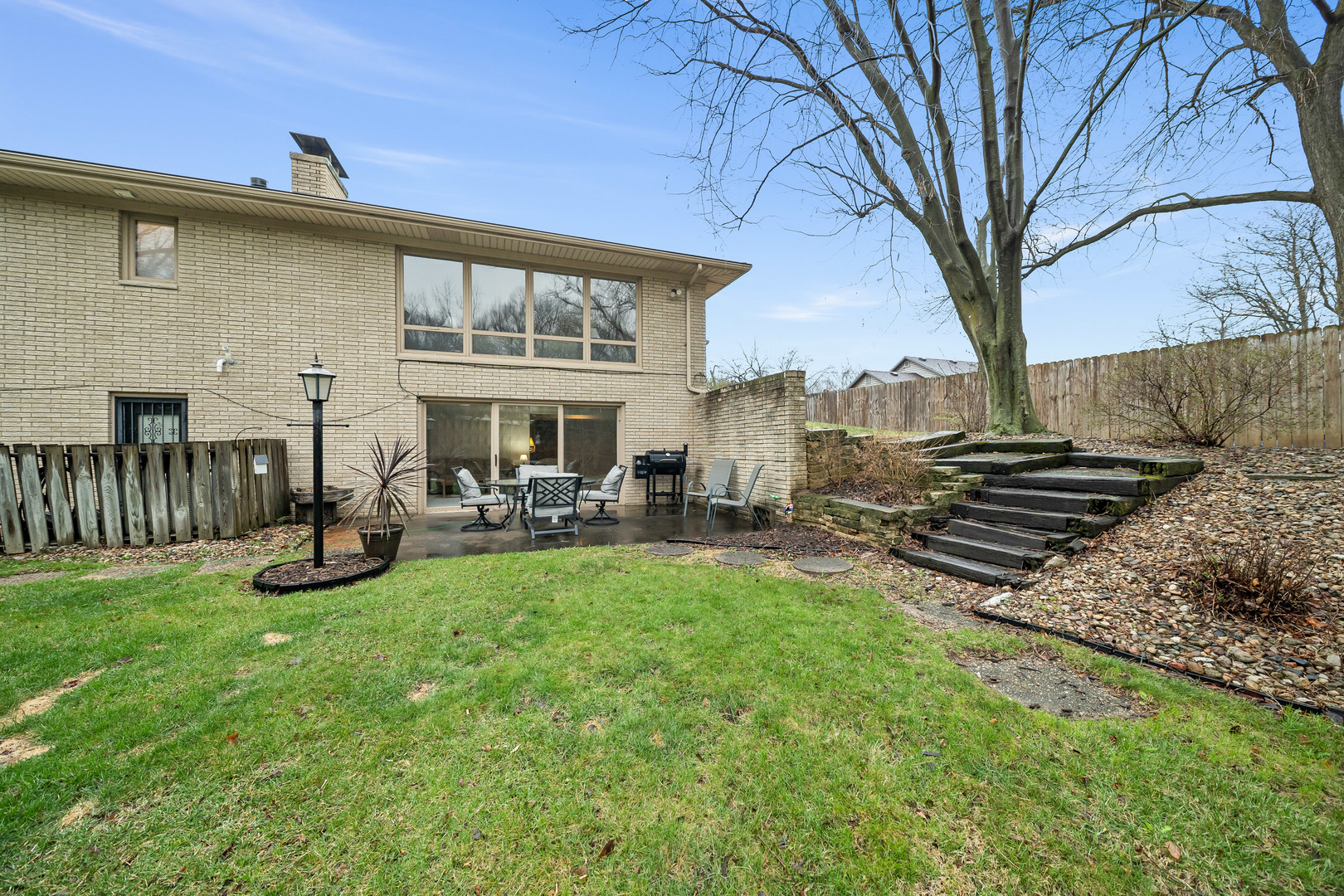 3138 12th Avenue Moline, IL 61265 - Photo 32 of 34 a view of swimming pool with outdoor seating and a garden