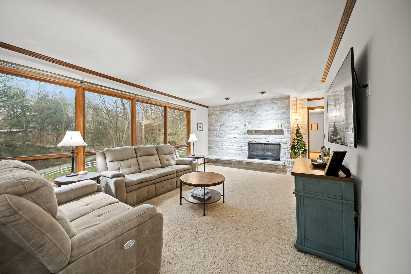 3138 12th Avenue Moline, IL 61265 - Photo 9 of 34 a living room with furniture and a large window