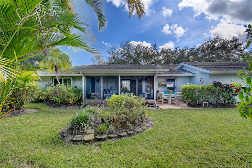 1843 Southeast Granada Lane Stuart, FL 34996 - Photo 8 of 47 Screened-In Lanai and Outside Grilling/Dining Patio